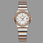 Luxury watch with rose gold and silver band on a white background, featuring the Poedagar brand.