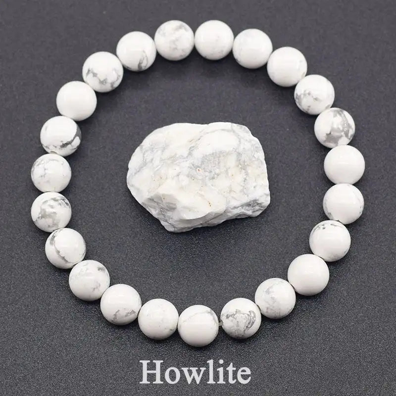 Howlite bracelet with a howlite stone on a dark background