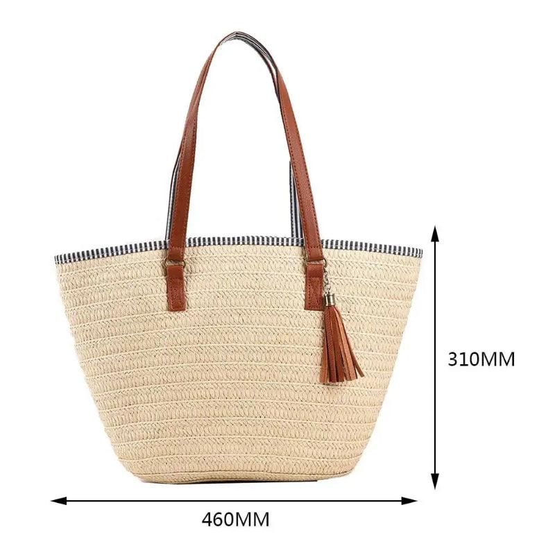 Beige straw tote bag with brown straps and tassel, shown with measurements on a white background.