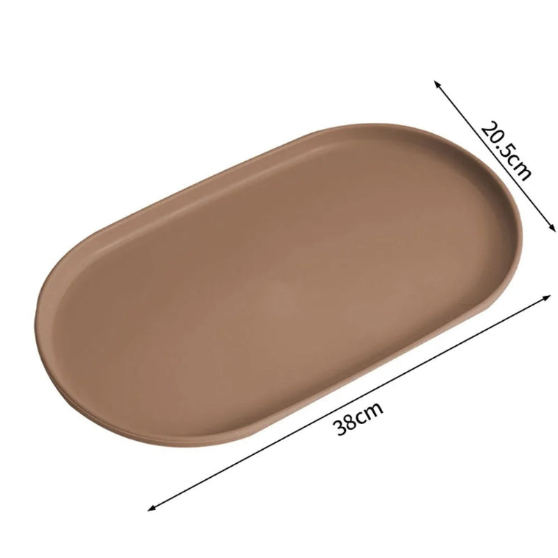 An oval brown tray shown on a white background with dimension arrows and labels indicating 38 cm length and 20.5 cm width.