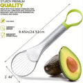 Avocado peeler with green handle and measurements, next to an avocado and its half on a white background.