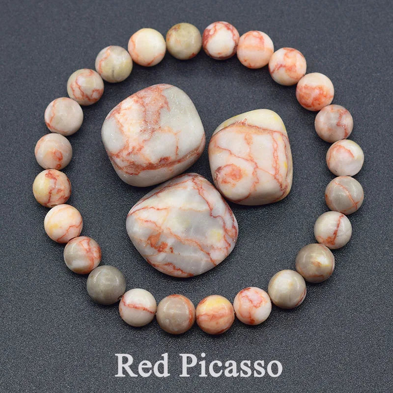 Marbleized stones arranged in a circle on a dark background with 'Red Picasso' text.