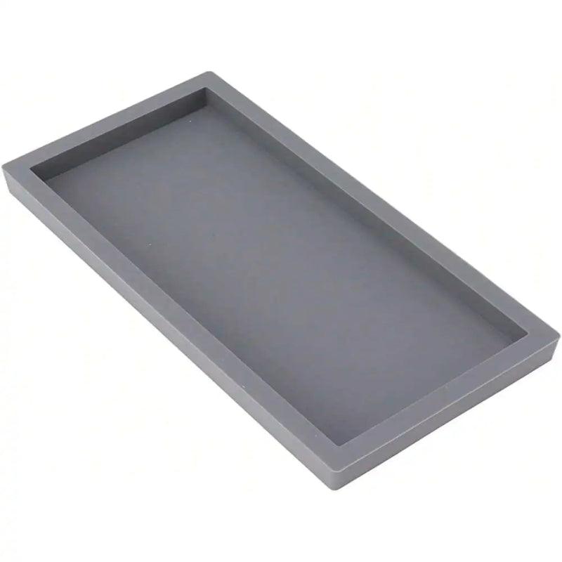 Gray rectangular silicone baking mold on a white background