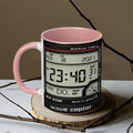 A Pink ceramic mug printed with a digital wave ceptor radar detector design, featuring a black face with red and blue accents and a pink handle.