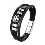 Black leather bracelet with silver metal accents on a white background