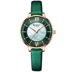 Green wristwatch with rose gold accents on a white background, featuring the brand 'Curren'.