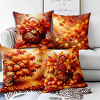 Three decorative pillows with autumn-themed designs on a couch.