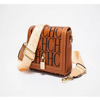 Brown handbag with 'CHC' branding on a white background