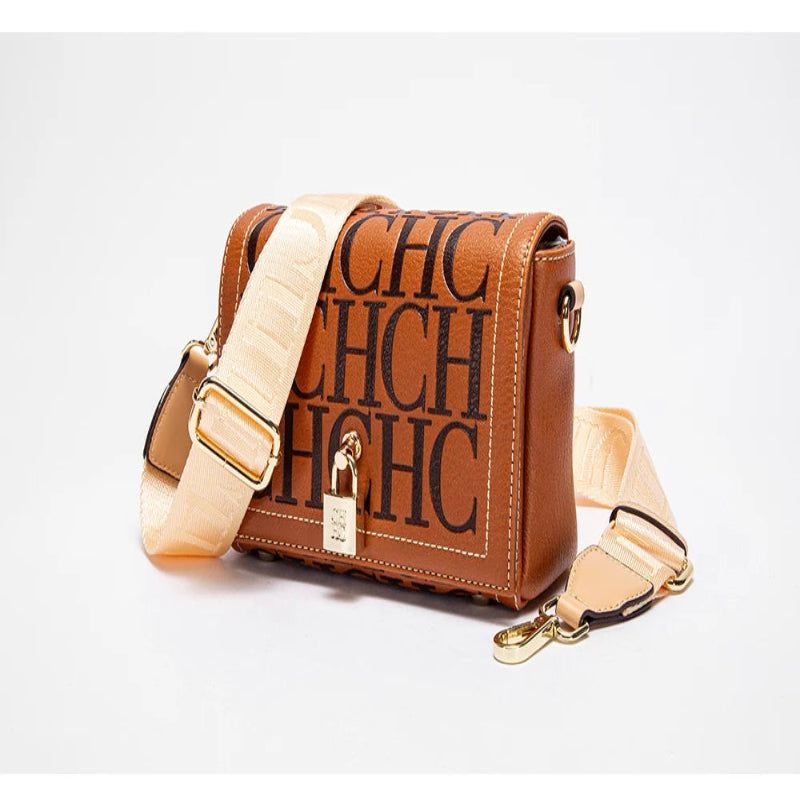 Brown handbag with 'CHC' branding on a white background