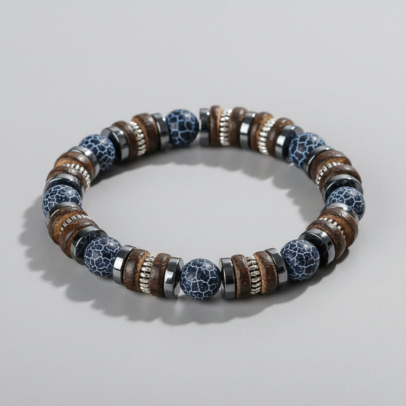 Beaded bracelet with 'Self-Love' text on a wooden surface