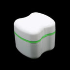 White rectangular container with a green band on a black background