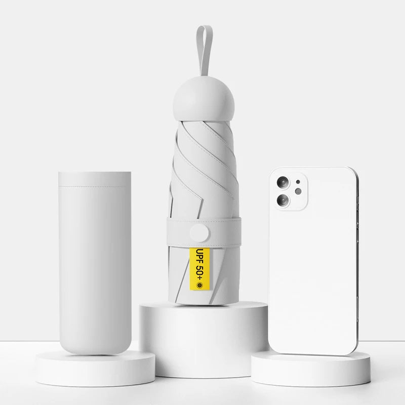 White cylindrical product with a yellow label next to a smartphone on a white background