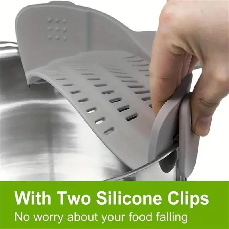 Kitchen sink strainer with silicone clips being used to catch food debris.