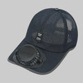 Black cap with a solar-powered fan attached on a white background