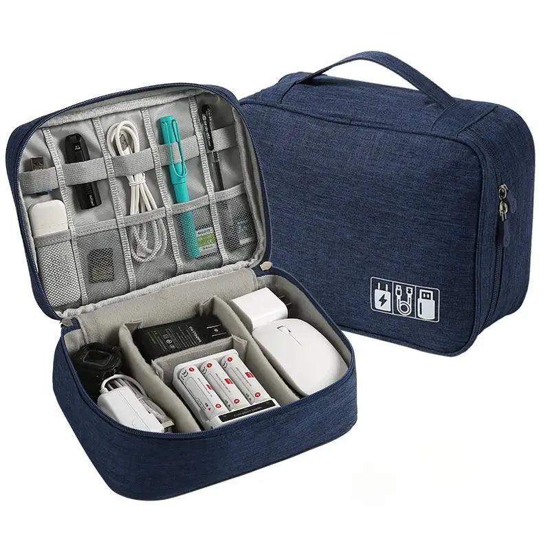 Blue travel organizer with electronic devices inside on a white background