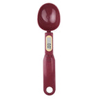 Digital measuring spoon with a red handle on a white background