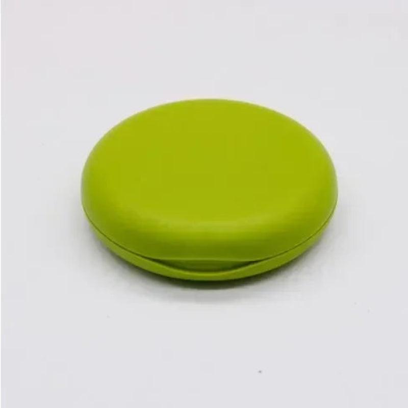 Green round container on a white background