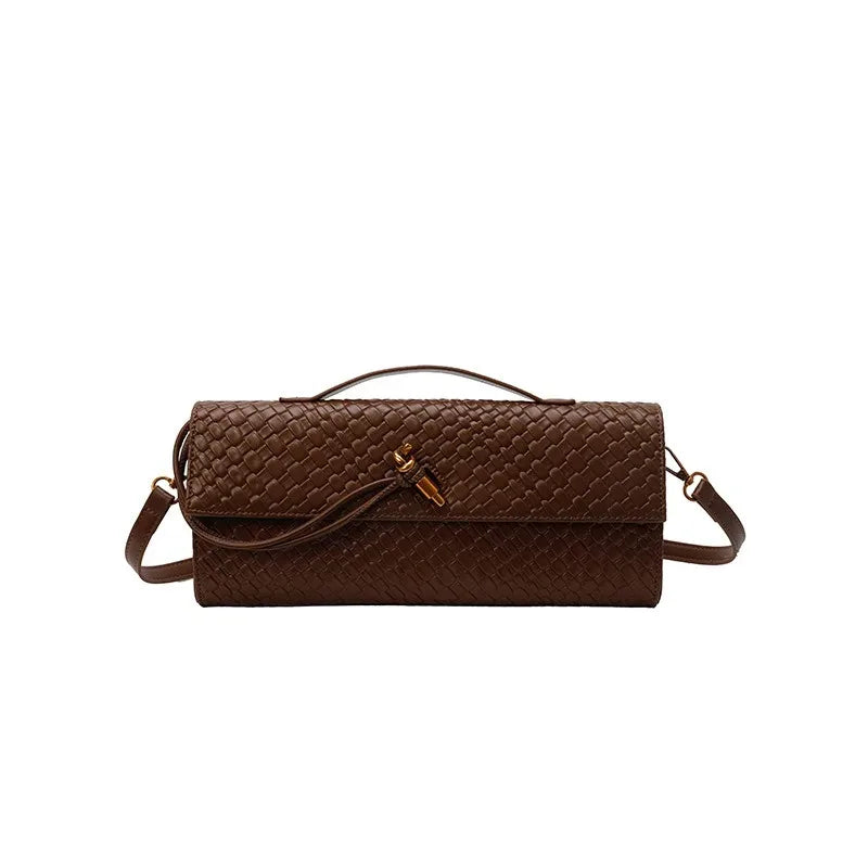 Brown textured handbag on a white background