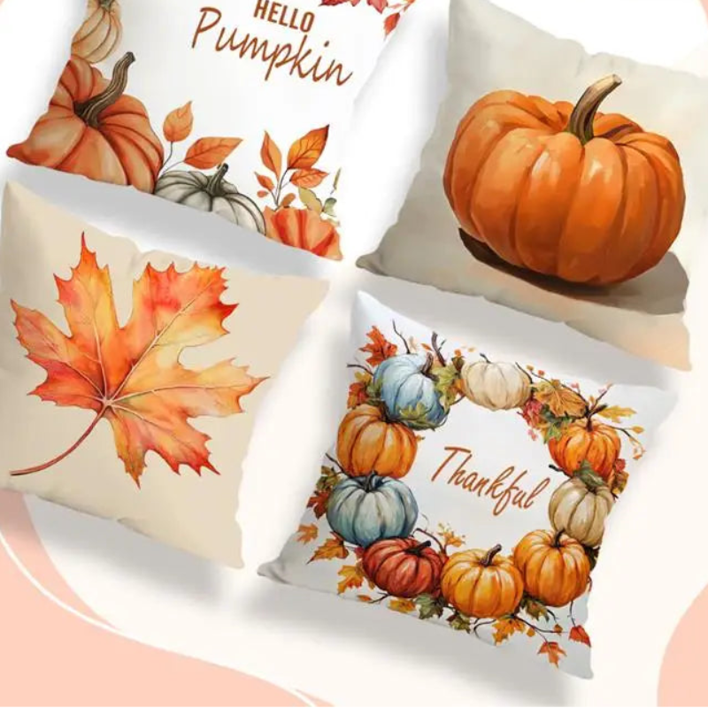 Four decorative throw pillow cases with autumn fall prints, including pumpkins, maple leaves, and 'Hello Pumpkin' and 'Thankful' text, arranged on a light background with peach abstract shapes and the text 'PILLOW CASE' and 'HD Digital Printing'.