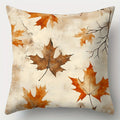Decorative pillow with autumn leaf pattern on a beige background