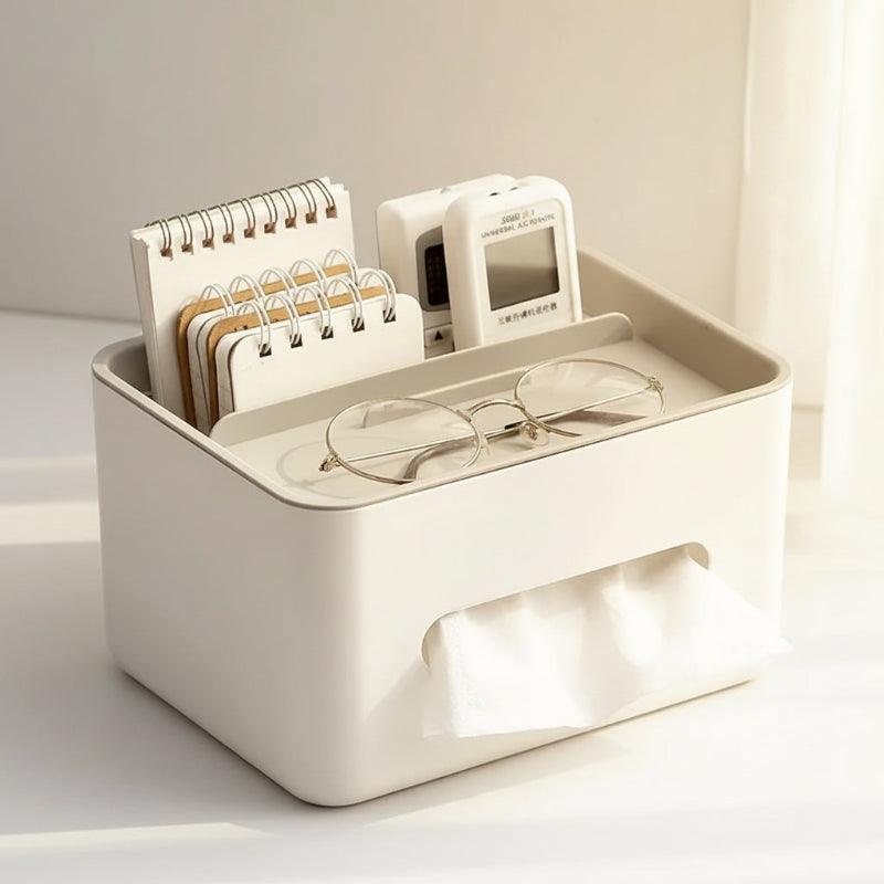 White desk organizer with glasses, notepads, and a digital device on a white background