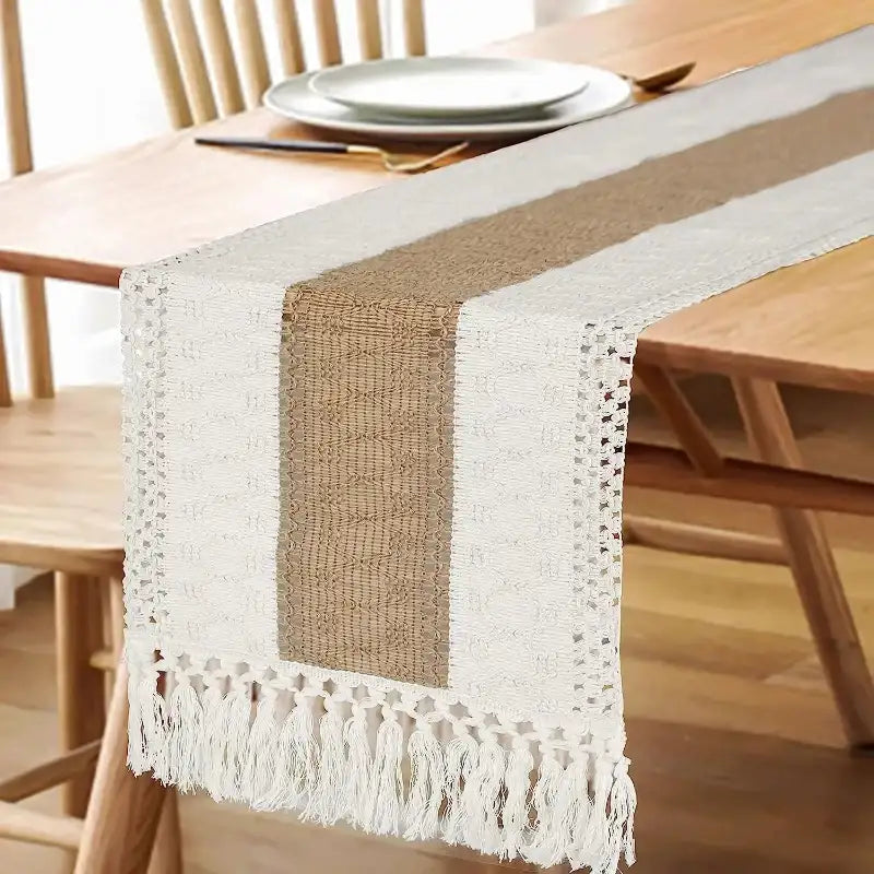 Table runner with white and brown stripes on a wooden table