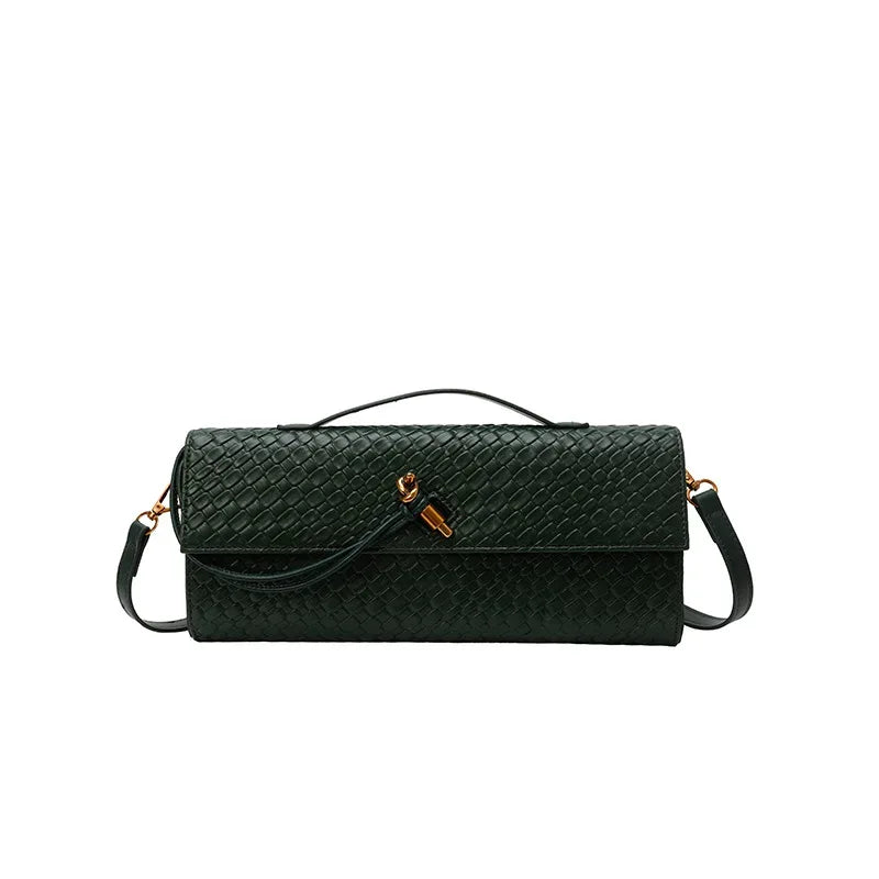 Green woven handbag on a white background