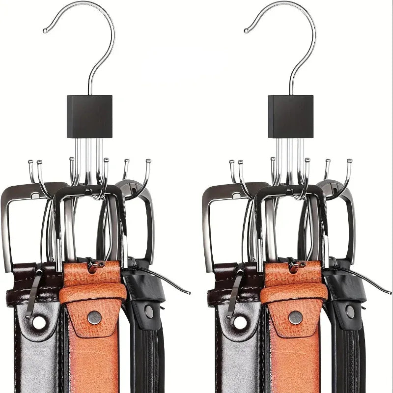 Two sets of leather belts with metal hooks on a white background