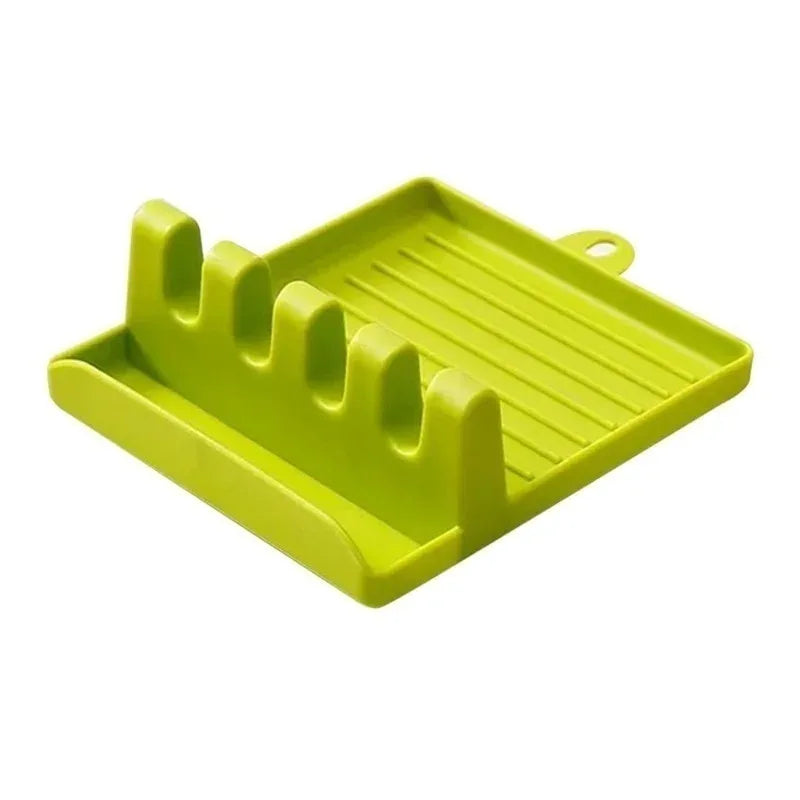 Green silicone dish drying rack on a white background