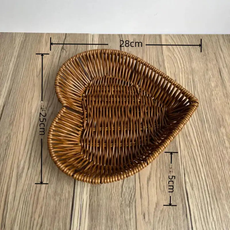 Woven basket with dimensions on a wooden surface