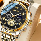 Gold and silver watch with black face on a beige background, featuring the OLEVS brand.