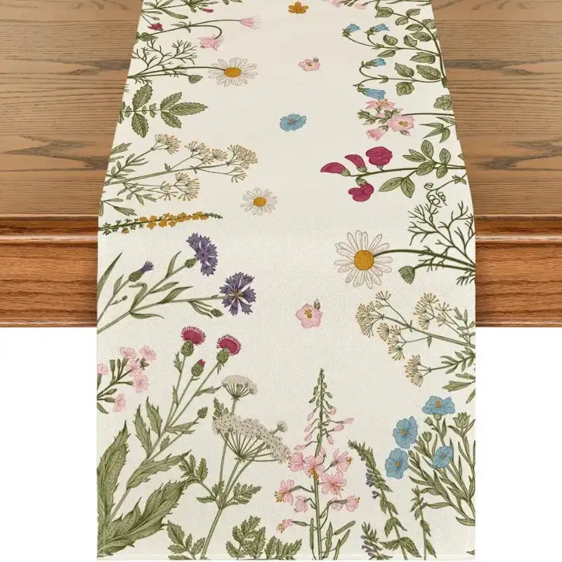 Floral patterned table runner on a wooden surface