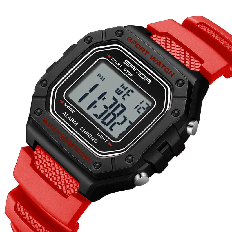 Digital watch with red strap and black casing on a white background