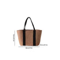 Woven bag with black straps and measurements on a white background