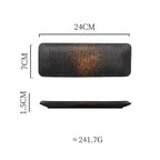 Rectangular black plate with measurements on a white background