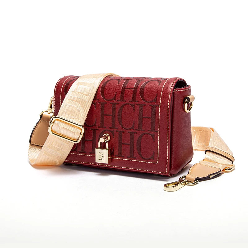 Red handbag with beige strap and 'CHIC' text on a white background