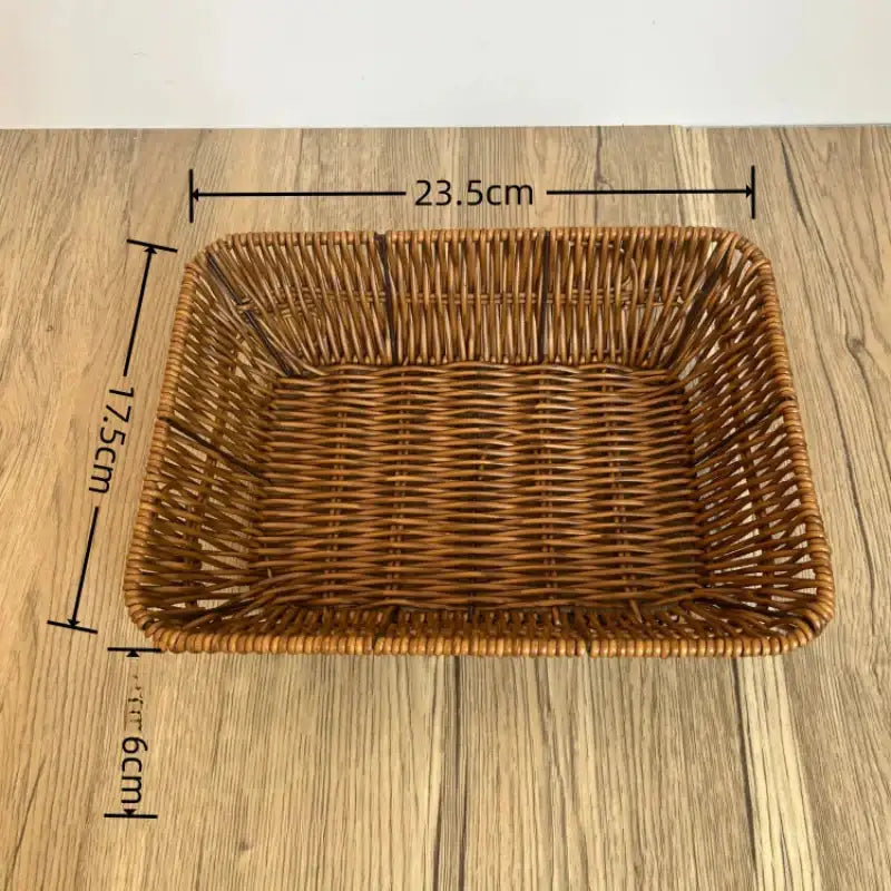 Wicker basket with dimensions on a wooden surface