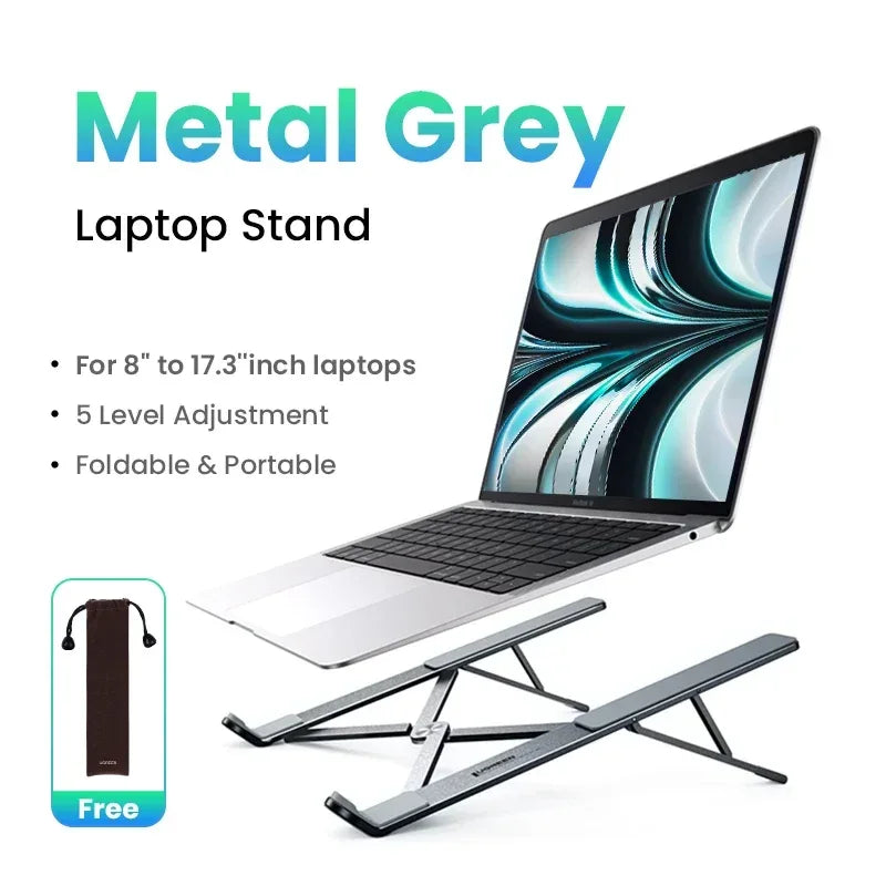 Metallic gray laptop stand with a laptop on it, displayed against a white background.