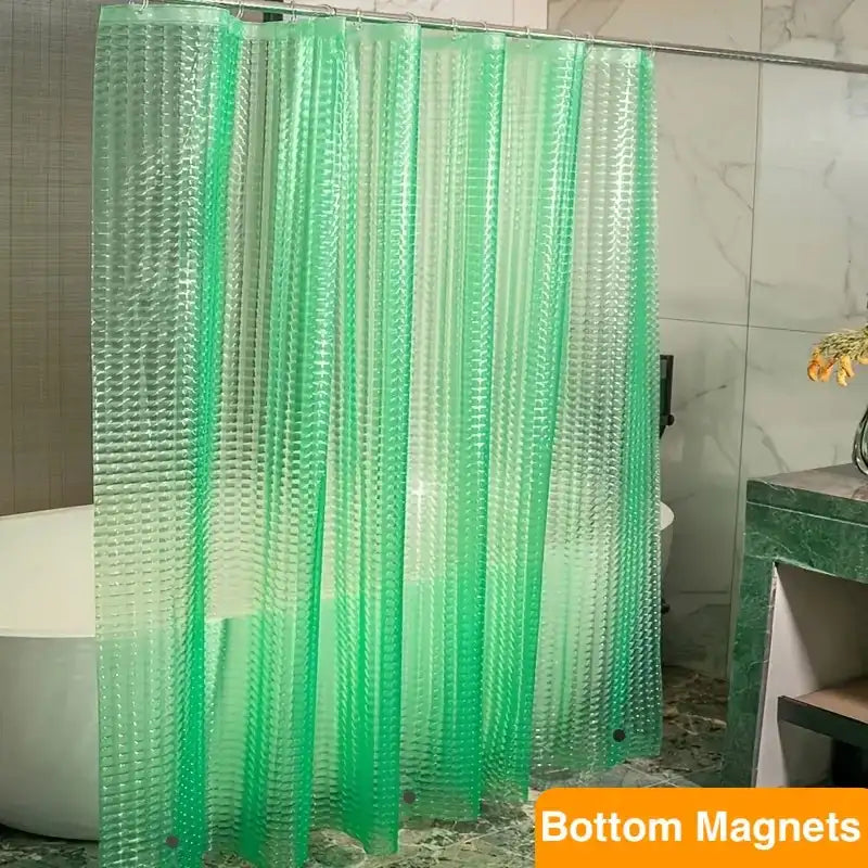 Green shower curtain with bottom magnets in a bathroom setting