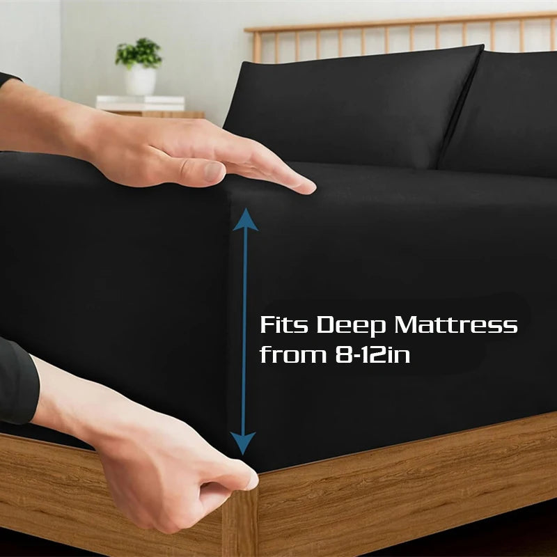 Black fitted sheet being adjusted on a bed with text indicating mattress depth compatibility.