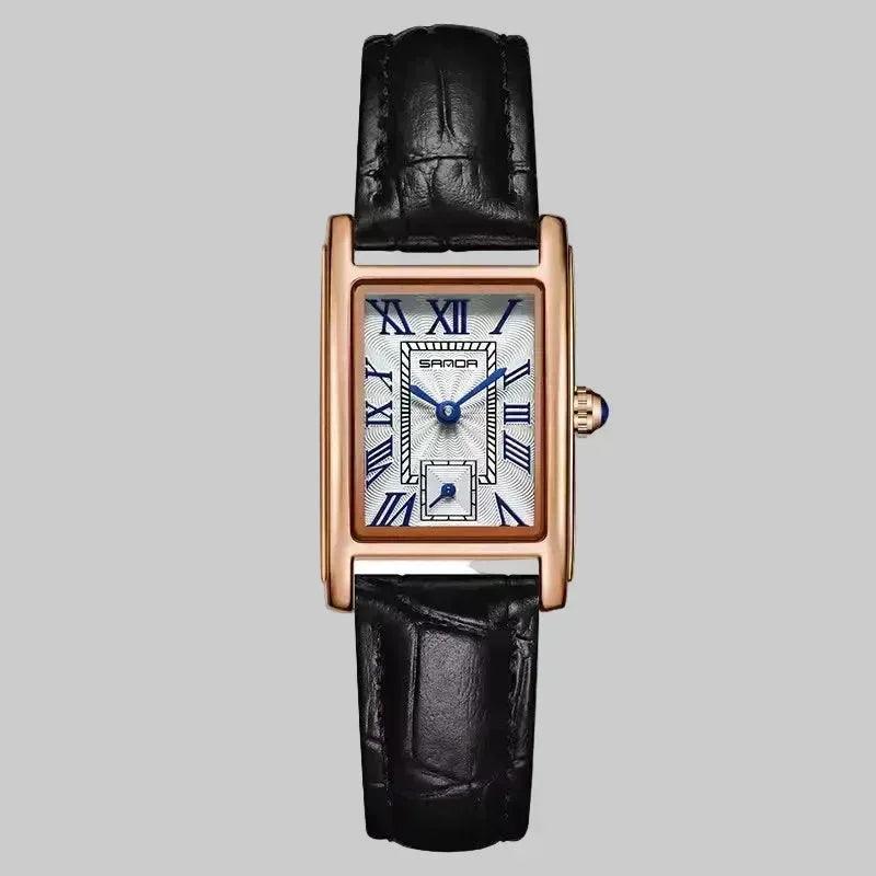 Black rectangular watch with rose gold frame and white face on a white background, featuring the brand 'SANDA'.