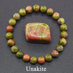 Unakite stone bracelet on a dark background with 'Unakite' text.