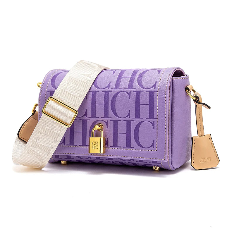 Purple handbag with white strap and gold accents on a white background