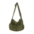 Green shoulder bag on a white background