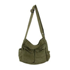 Green shoulder bag on a white background