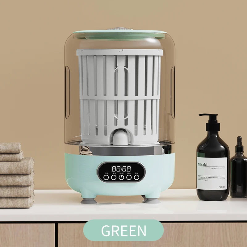 Small kitchen appliance on a countertop with bottles and towels in the background