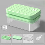 Green and clear plastic container with lid on a gray background