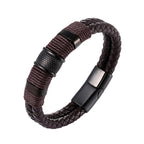 A men's braided leather bracelet in dark brown and black, featuring textured metal accents and a black magnetic clasp, shown on a plain white background.