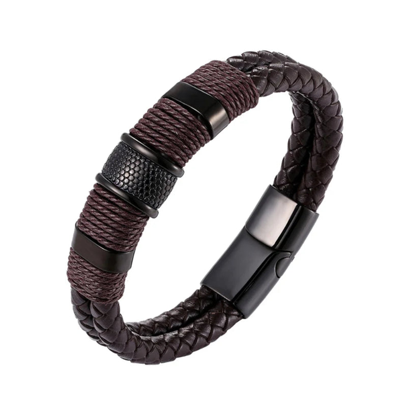 A men's braided leather bracelet in dark brown and black, featuring textured metal accents and a black magnetic clasp, shown on a plain white background.