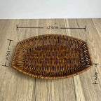 Wicker bread basket with dimensions on a wooden surface